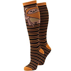 These officially licensed Star Wars socks will keep you company on your next voyage to unfamilliar territory. This pair of knee high socks features a chibi version of an adorable Ewok printed on the ankle, with black and brown stripes throughout. Fit...